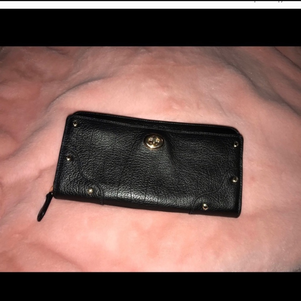 Coach turnlock wallet.